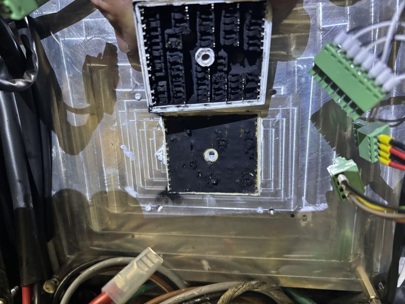Unit 3 inverter: heatsink after the power module was lifted, charred thermal pad.