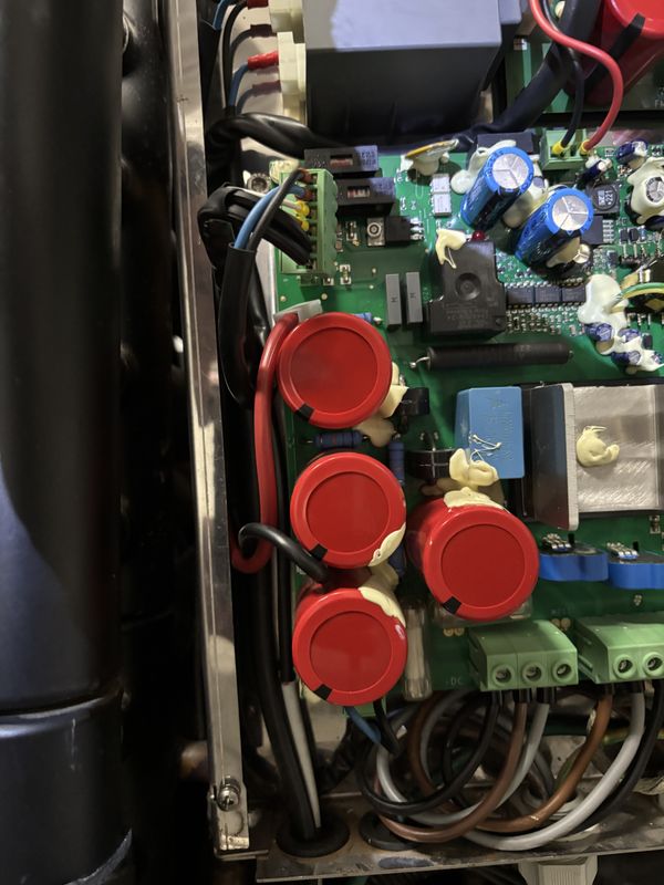 Unit 3 inverter cabinet: control board and DC-link capacitor bank (red capacitors).