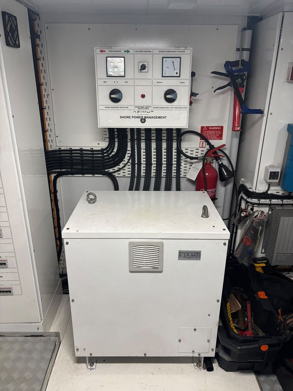 Shore-power compartment: management panel above the 65 kVA on-board isolation transformer.