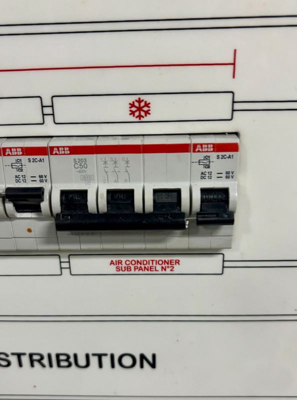 AC sub-panel 2: three-pole breaker (ABB S203 C50) in the tripped position.